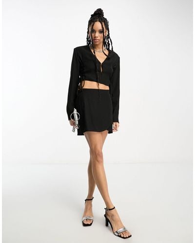 Annorlunda Minifalda negra con diseño envolvente - Negro