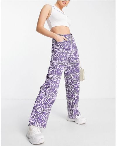 Missguided Pantaloni con fondo ampio e stampa zebrata lilla - Viola