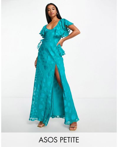 ASOS Asos design petite - robe longue en satin à pois avec manches évasées et dos nu - aigue-marine profond - Bleu