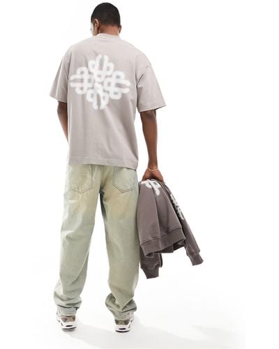 The Couture Club T-shirt color moka con stampa con emblema sfocata - Bianco