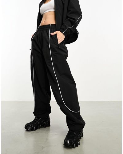 The North Face Tek Woven Track Pants With Reflective Piping - Black