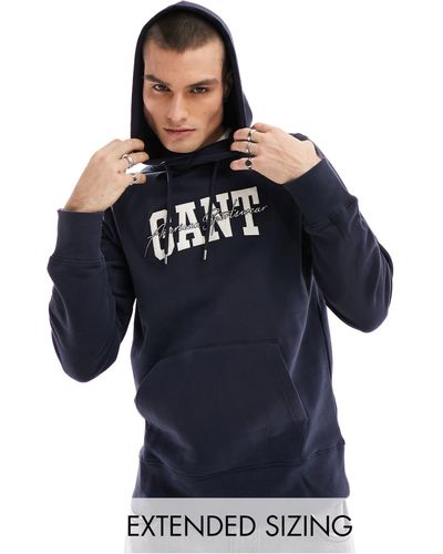GANT Sweat à capuche avec logo arqué style universitaire - Bleu