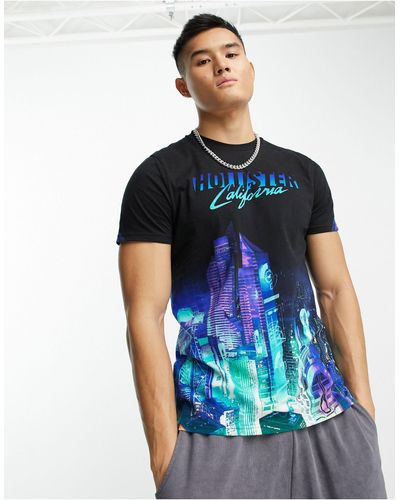 Hollister T-shirt nera con stampa panoramica di città e scritta del logo - Blu