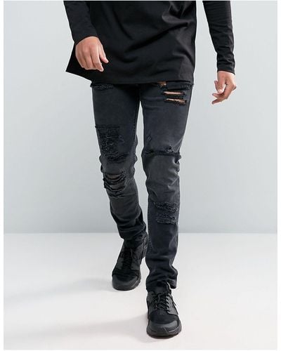 ASOS Skinny Jeans In 12.5oz With Mega Rips In Washed Black