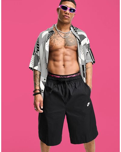 Nike – club – oversized-shorts - Pink