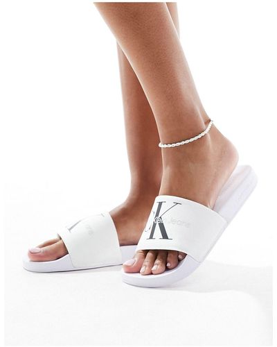 Calvin Klein Sliders multicolore con monogramma del logo - Bianco
