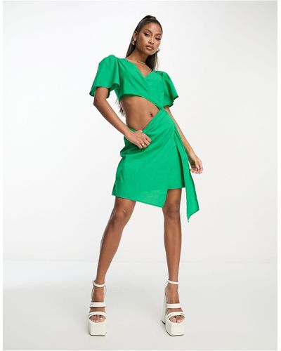 Rebellious Fashion Wrap Front Linen Look Mini Dress With Assymmetric Cut Out - Green
