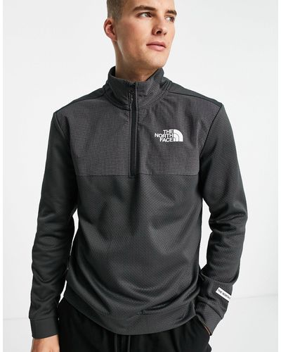 the north face mountain athletics quarter zip top