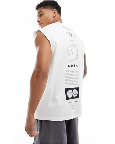 ASOS Camiseta hueso extragrande sin mangas con estampado en el centro - Blanco