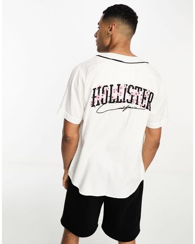 Hollister Baseballshirt Met Korte Mouwen En Logoprint Met Kersenbloesems Op - Wit