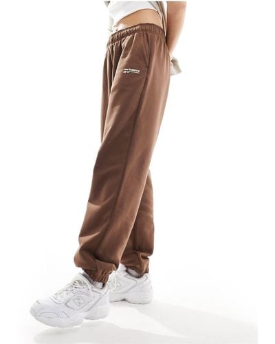 New Balance – linear heritage – fleece-jogginghose - Weiß