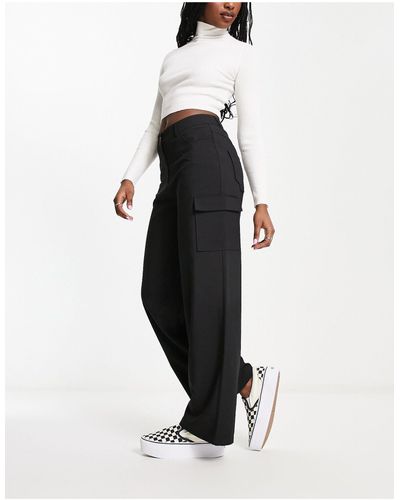 COLLUSION Plus puddle flare pants with busted seams in grey