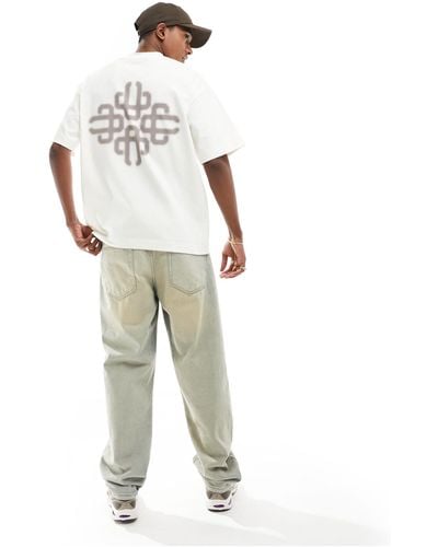 The Couture Club T-shirt sporco con stampa con emblema sfocata - Bianco
