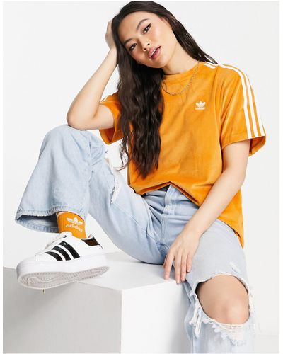 adidas Originals T-shirt en velours côtelé à trois bandes - Orange