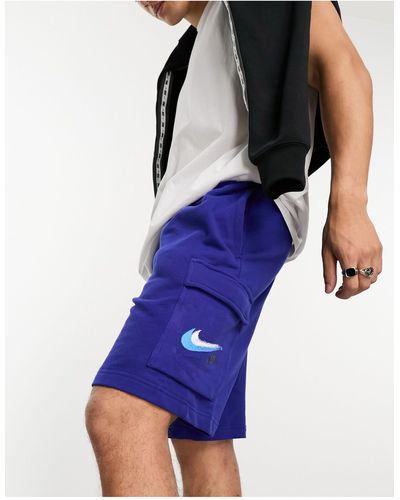 Nike Pantalones cortos oscuro real cargo con logo efecto grafiti swoosh - Morado