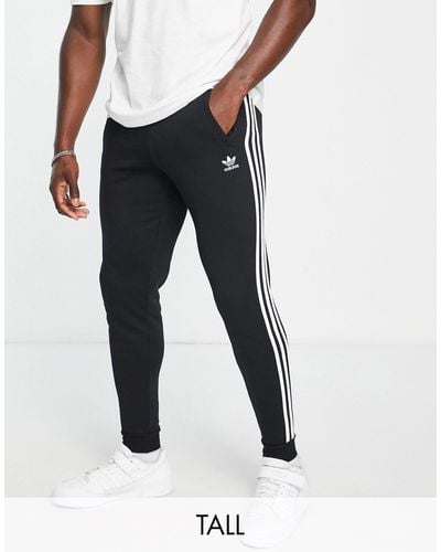 adidas Originals Tall - Adicolor - Smalle joggingbroek Met 3-stripes - Zwart