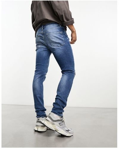 Blue ASOS Jeans for Men | Lyst