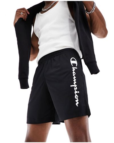 Champion Athletic - pantaloncini neri con logo sulla gamba - Nero