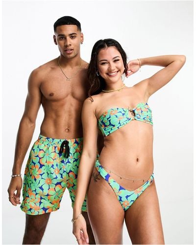 Kulani Kinis – serene marine – bikinihose mit retro-blumenprint und v-schnitt - Mehrfarbig