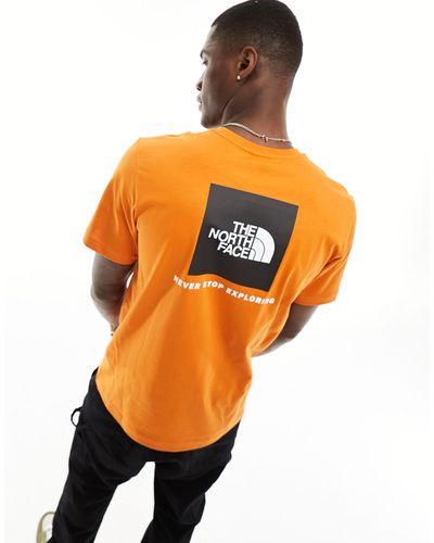 The North Face Camiseta color óxido con estampado en la espalda redbox - Naranja