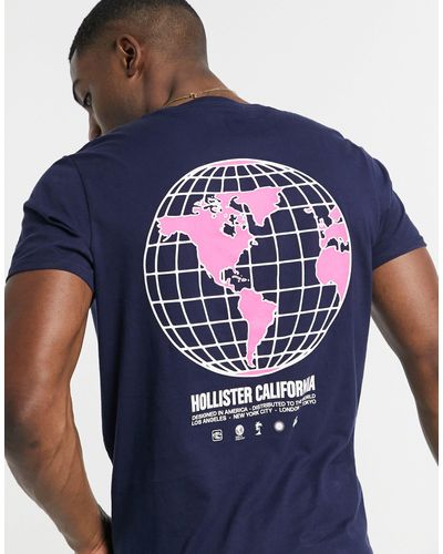 Hollister Camiseta azul marino con logo del mundo estampado en la espalda