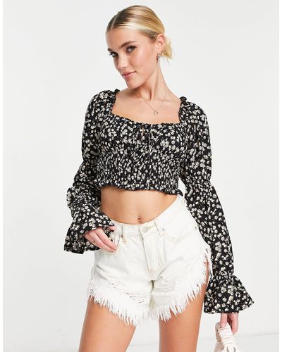 Love Triangle Crop Top Met Lange Mouwen En Strikje Aan - Meerkleurig