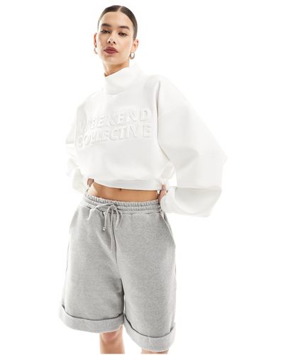 ASOS Asos design - weekend collective - sweat-shirt en néoprène à col montant avec logo embossé - Blanc