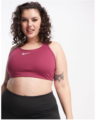Nike Plus - swoosh dri-fit - reggiseno sportivo a supporto medio con logo e imbottitura - Rosa