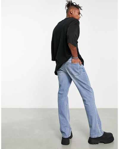 ASOS Jeans bootcut rétro lavaggio medio - Bianco