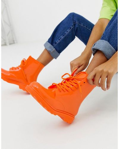 ASOS Global Lace Up Rain Boots In Neon Orange