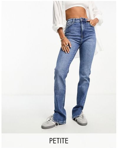 Bershka Petite - jeans bootcut a vita alta lavaggio scuro - Blu