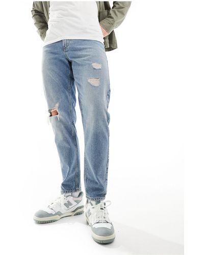 ASOS Jeans rigidi modello classico lavaggio chiaro con strappi - Blu