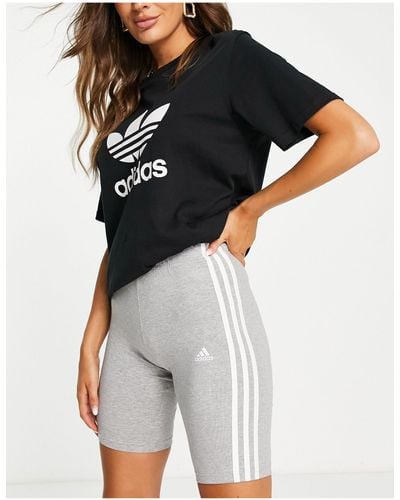 adidas Originals Adidas - sportswear essential - leggings corti grigi con 3 strisce - Nero