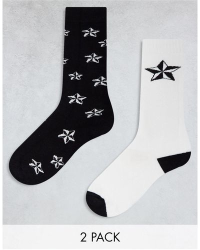 Threadbare Ski - confezione da 2 paia di calzini bianchi e neri con stampa di stelline - Nero