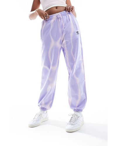 adidas Originals Dye Allover Print joggers - Purple