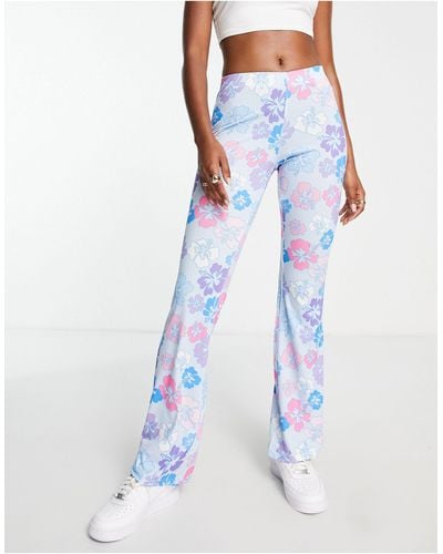 NA-KD Pantalon évasé à imprimé fleurs - Multicolore