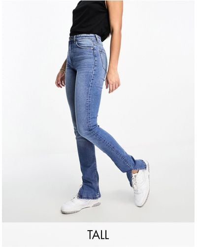 Bershka Tall - jeans bootcut a vita alta lavaggio scuro - Blu
