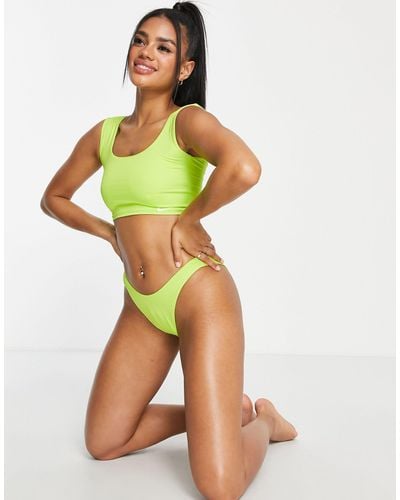 Nike – figurbetonte bikinihose - Grün