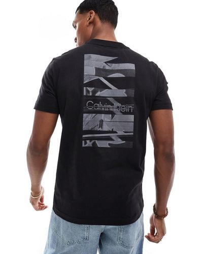Calvin Klein T-Shirt Nera Con Stampa Del Logo Sulla Schiena - Nero