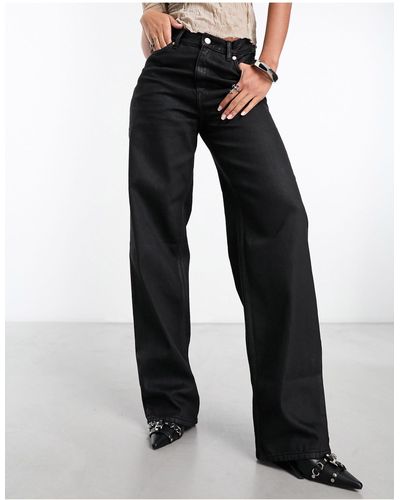 Weekday Rail - jean enduit coupe droite ample à taille mi-haute - Noir