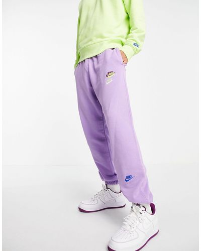 Nike Essential Fleece+ Multi Logo Casual Fit Cuffed joggers - Purple