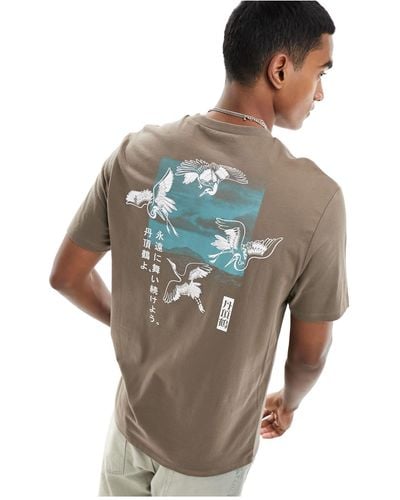 ASOS Camiseta extragrande con estampado estilo souvenir en la espalda - Marrón