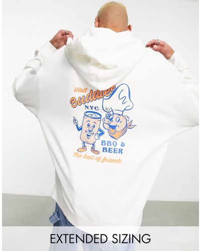 ASOS Sweat à capuche oversize avec imprimé dessin animé au dos - blanc cassé - Neutre