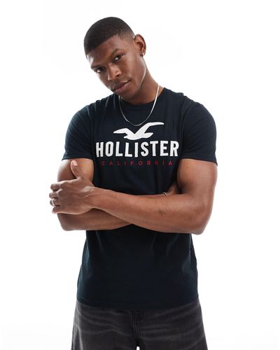 Hollister Camiseta negra con logo tech - Azul