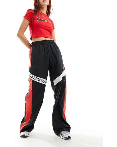 Nike Streetwear - pantaloni sportivi neri e rossi - Rosso