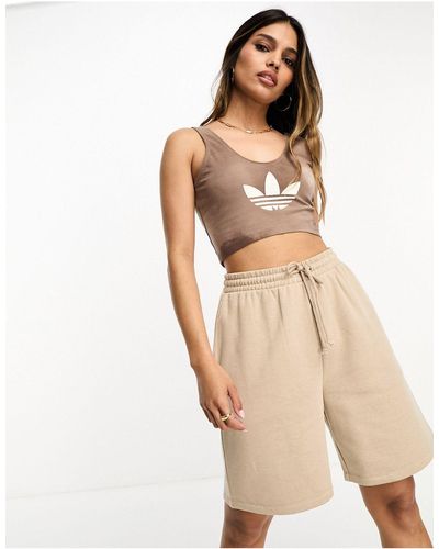 adidas Originals Brassière à logo trèfle - beige - Neutre