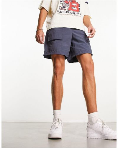 New Look Pantalones cortos cargo con varios bolsillos - Azul