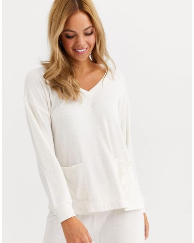 Women'secret Top confort oversize à poches en jersey côtelé - Sable - Blanc