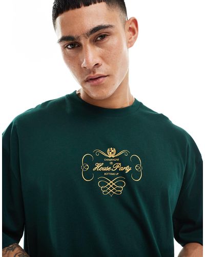 ASOS T-shirt oversize scuro con scritta sul petto - Verde