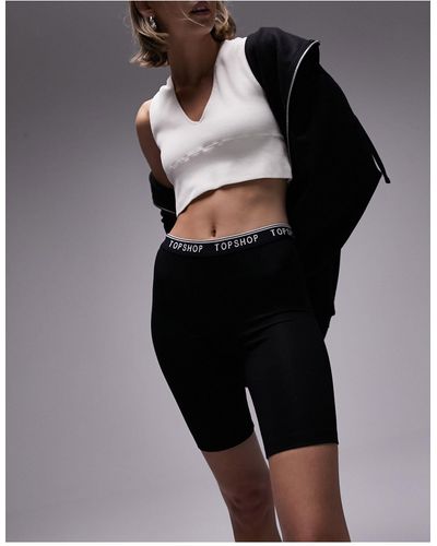 Topshop Unique Pantaloncini leggings neri con fascia elasticizzata con logo - Nero
